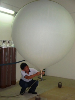 Weather balloon is inflated with helium gas.